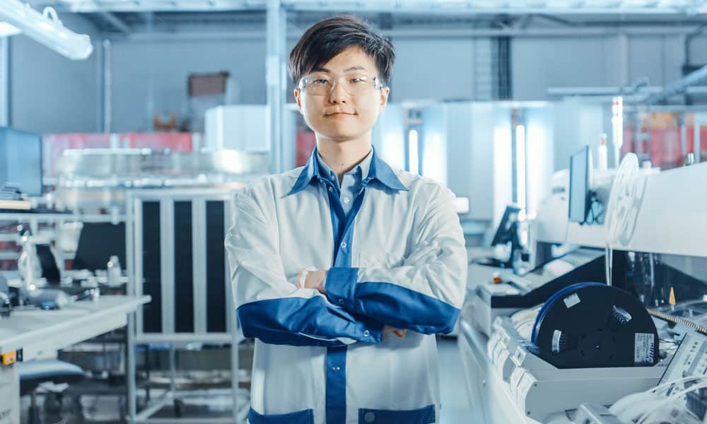medical professional standing with arms crossed