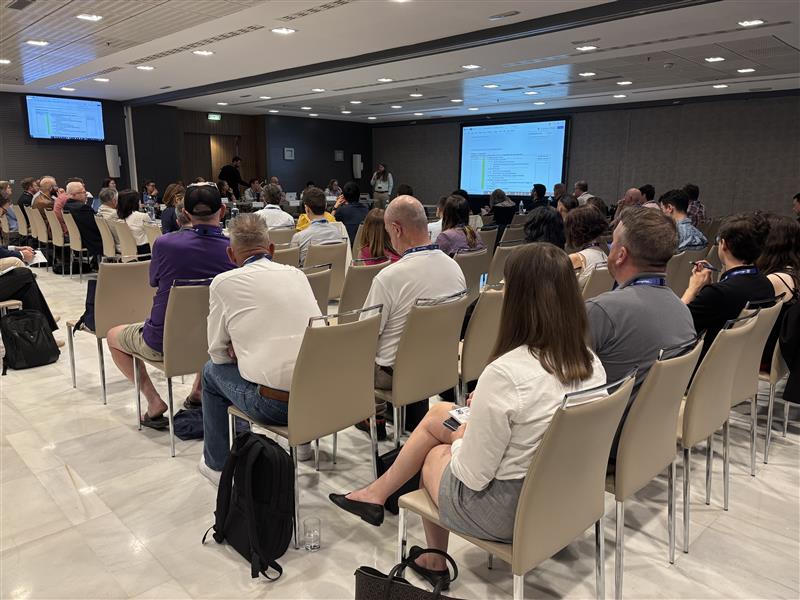 speaker talking to room of people