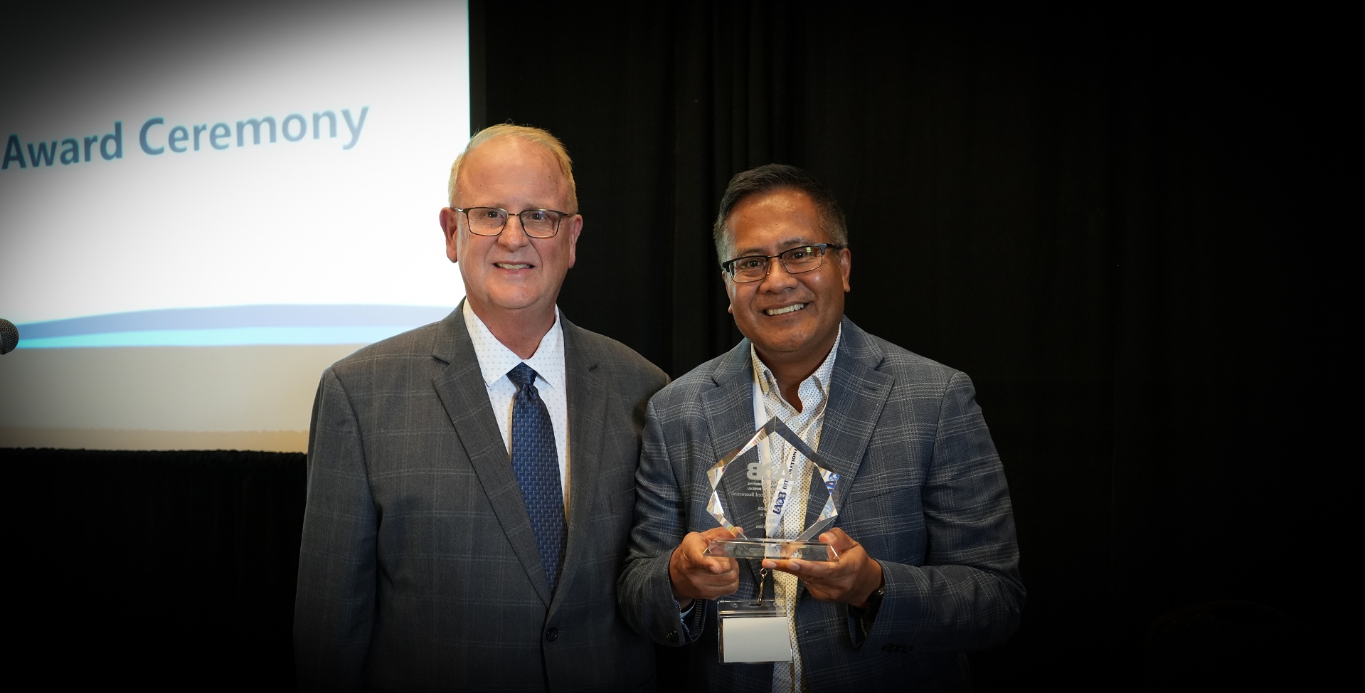 frans dolman accepting award from iaob at ceremony