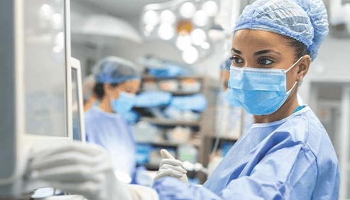 healthcare professional using medical device