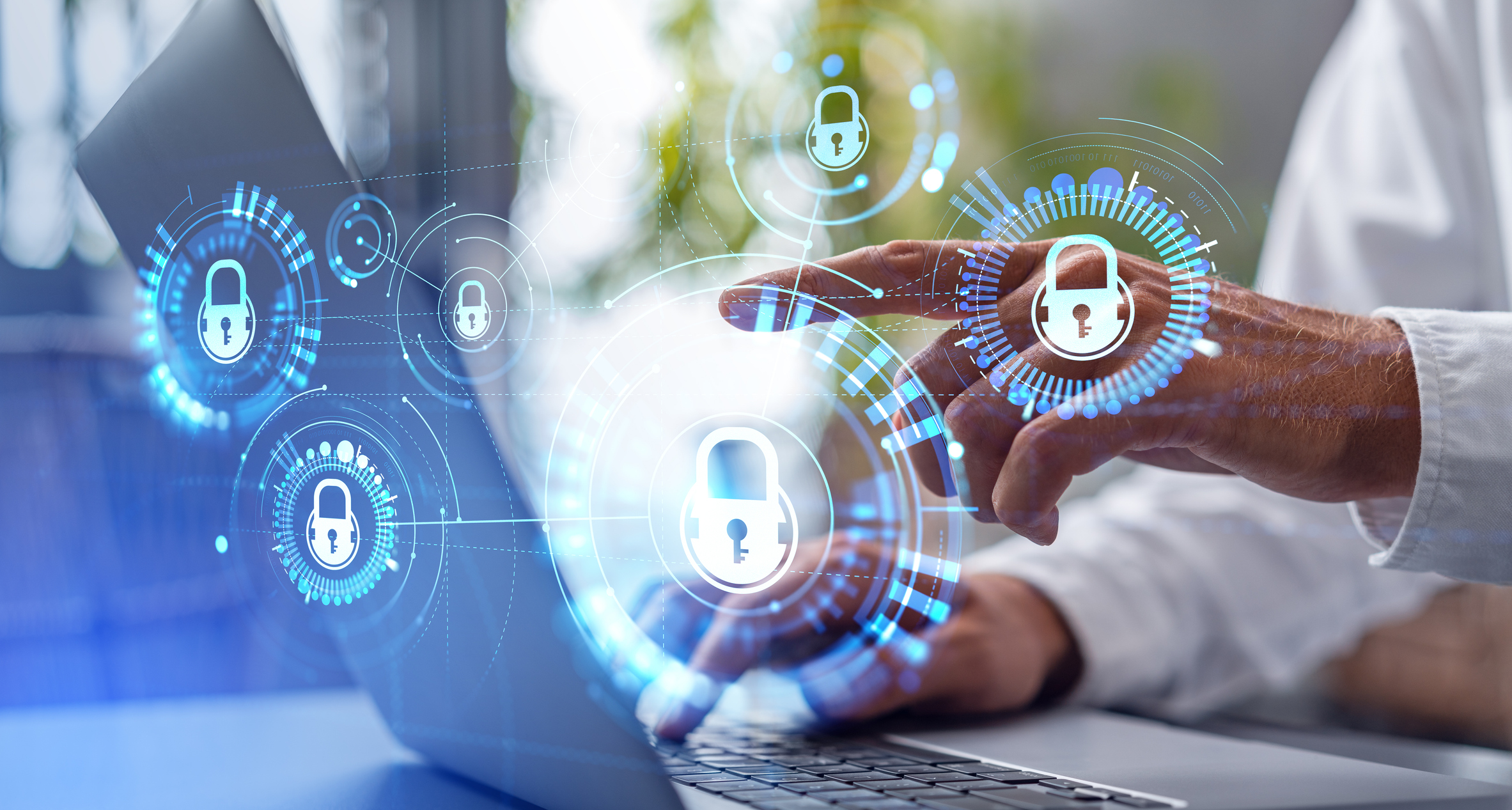 person pointing to laptop depicting data security