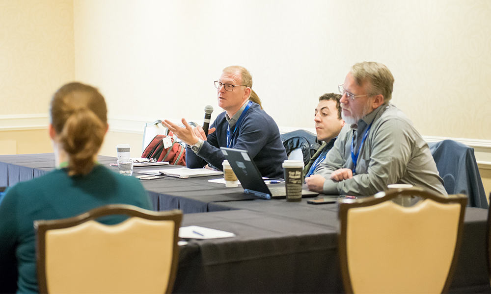 people at a nadcap meeting in a discussion