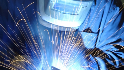 closeup of man welding